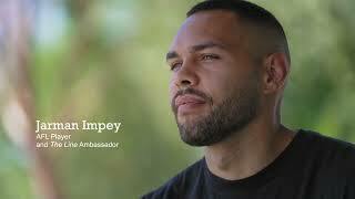 With tress in background, Jarman Impey, AFL Player with dark hair and a beard wears a black t-shirt and stares into space. Text: Jarman Impey AFL Player and 'The Line' Ambassador.