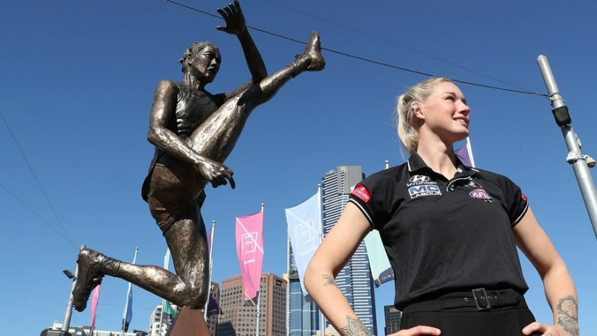 The famous kick of AFLW player Tayla Harris has been immortalised in a bronze statue (AAP: David Crosling)